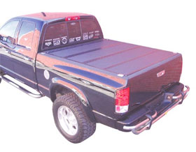 Extang tonneau on white Ford Pick up