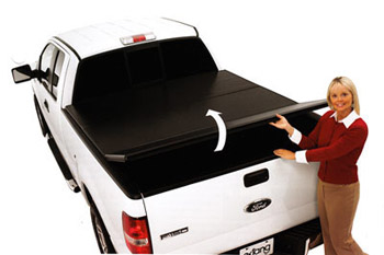 Extang hard tonneau on white Ford Pick up truck