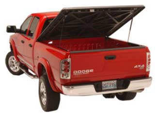 Undercover Hard Tonneau Truck bed cover on red truck